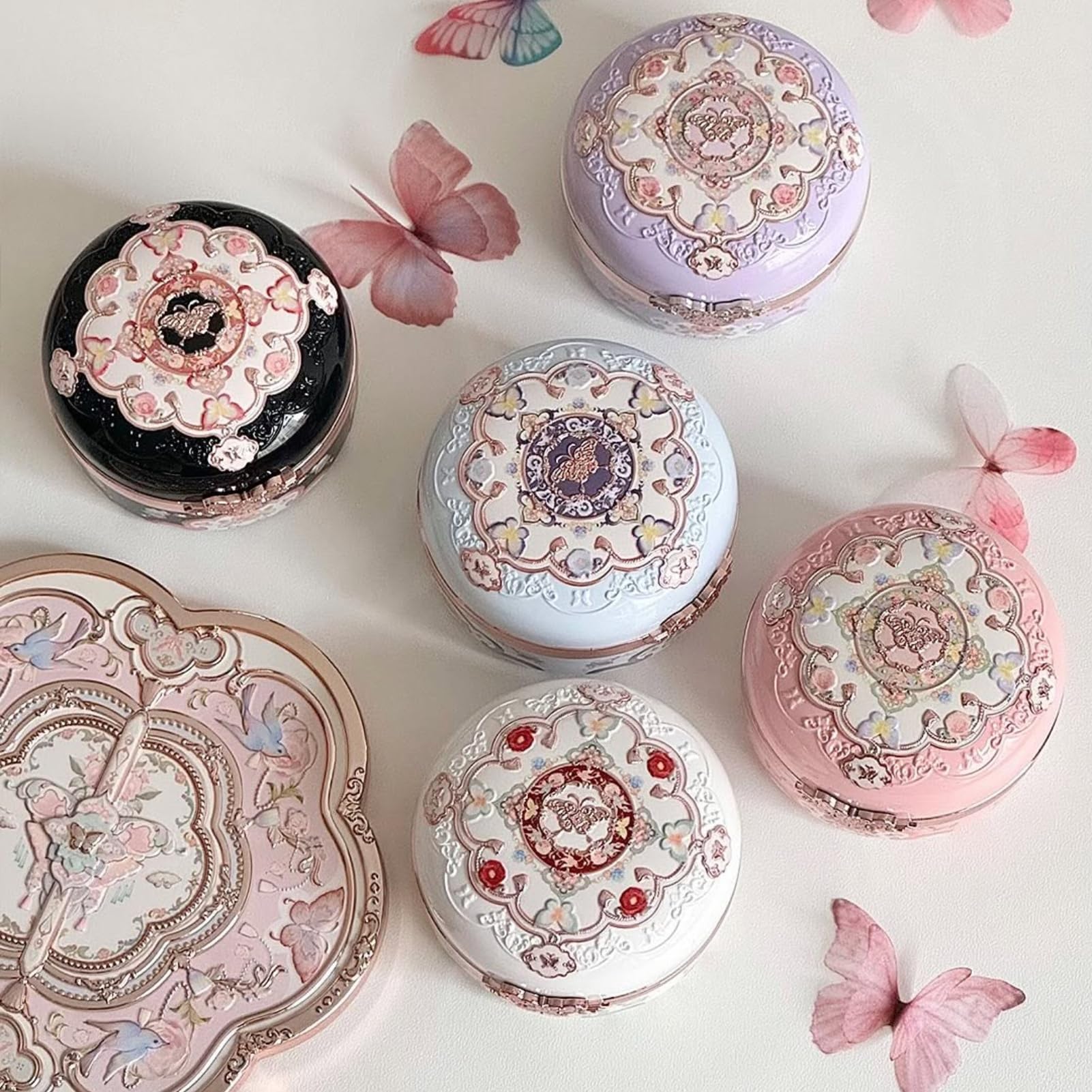 Flower Knows portable compact kisses your vanity or bag for everyday touch-ups.