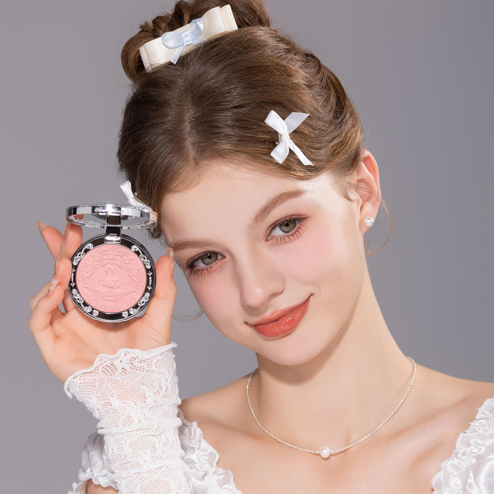 Flower Knows Romanticism soft pink swatch highlights natural tone for everyday wear.