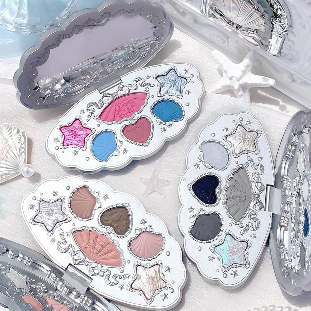 Flower Knows Shells Jewel Deep Sea shade offers sultry smoky grey looks.