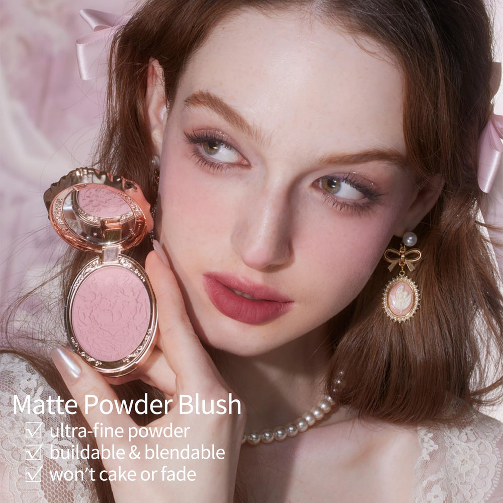 Flower Knows ultra-fine powder blends for natural matte finish on cheeks.