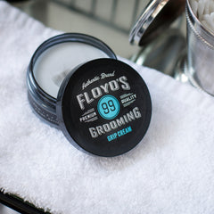 Floyd's 99 Grip Cream applied to hair shows even distribution and texture