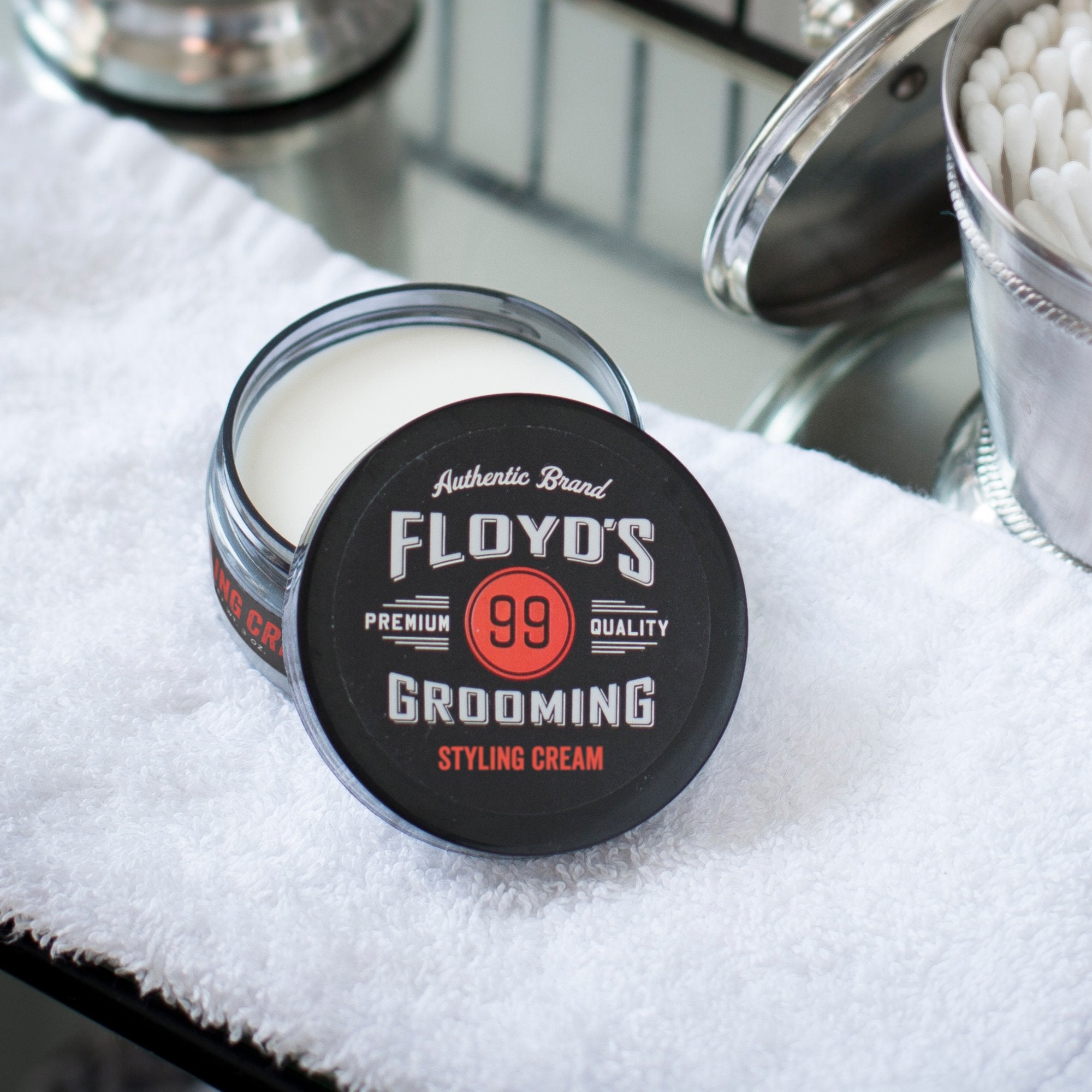 Floyd's 99 Styling Cream creamy-texture image emphasizes easy, even application.
