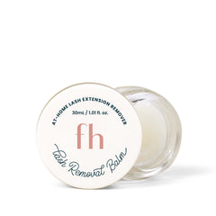 FlutterHabit Lash Removal Balm tube closeup demonstrates residue-free, gentle lash removal.