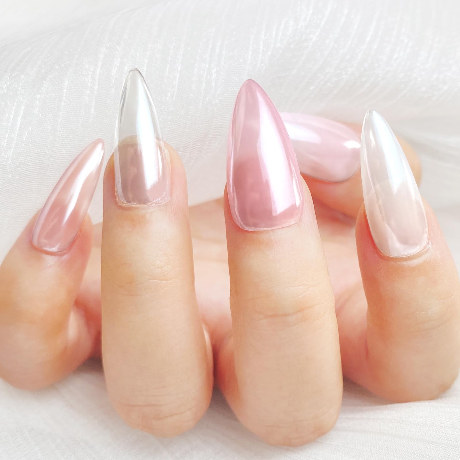 FNNZ unicorn chrome nail powder application on nails reveals mirror finish and aurora effect