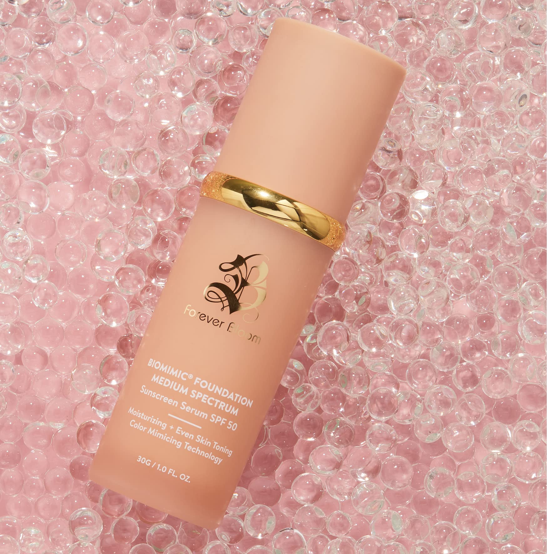 Forever Bloom Bio Mimic Foundation glow finish delivers luminous, silky skin texture.