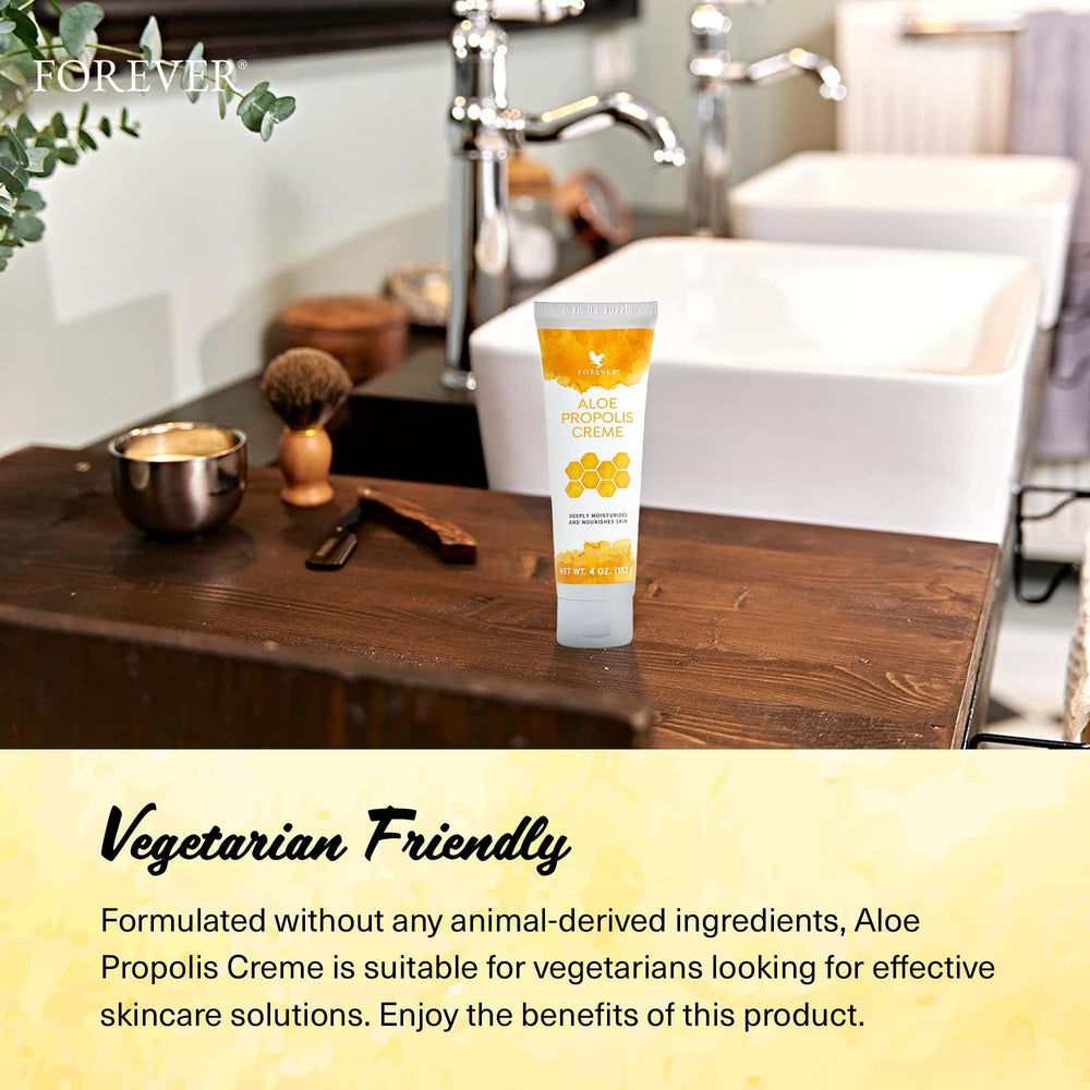 Forever Living Aloe Propolis Creme in use on hands for calming hydration
