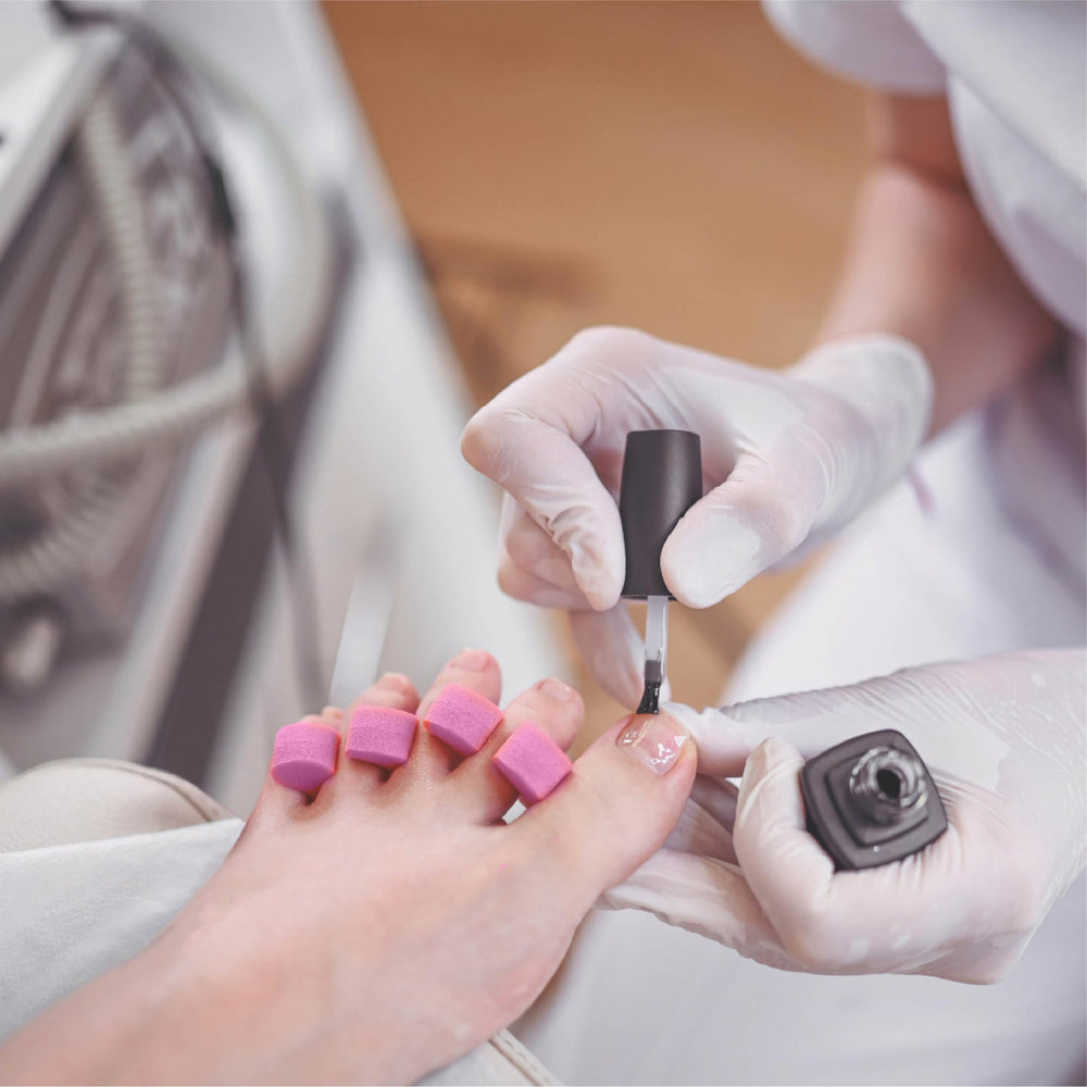 ForPro Professional Collection cotton candy pink toe separators shown ready for pedicure services.