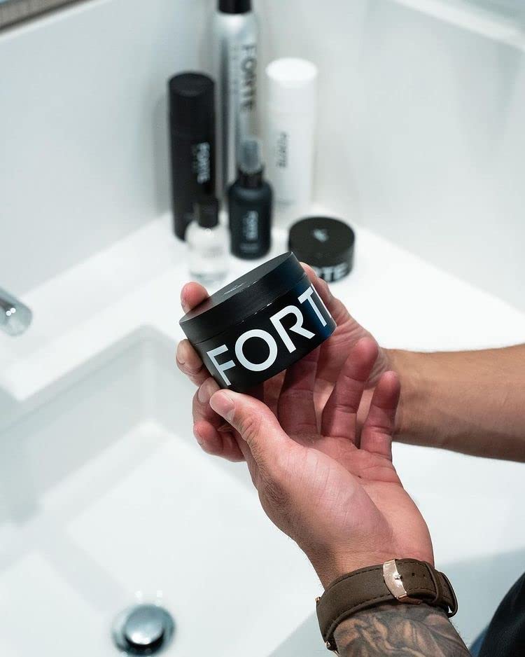Forte Series Molding Paste textured hair display highlights volume and definition.