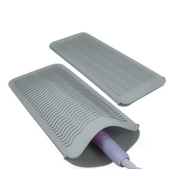 Fouews silicone heat-resistant mat pouch protects countertops from hot styling tools.