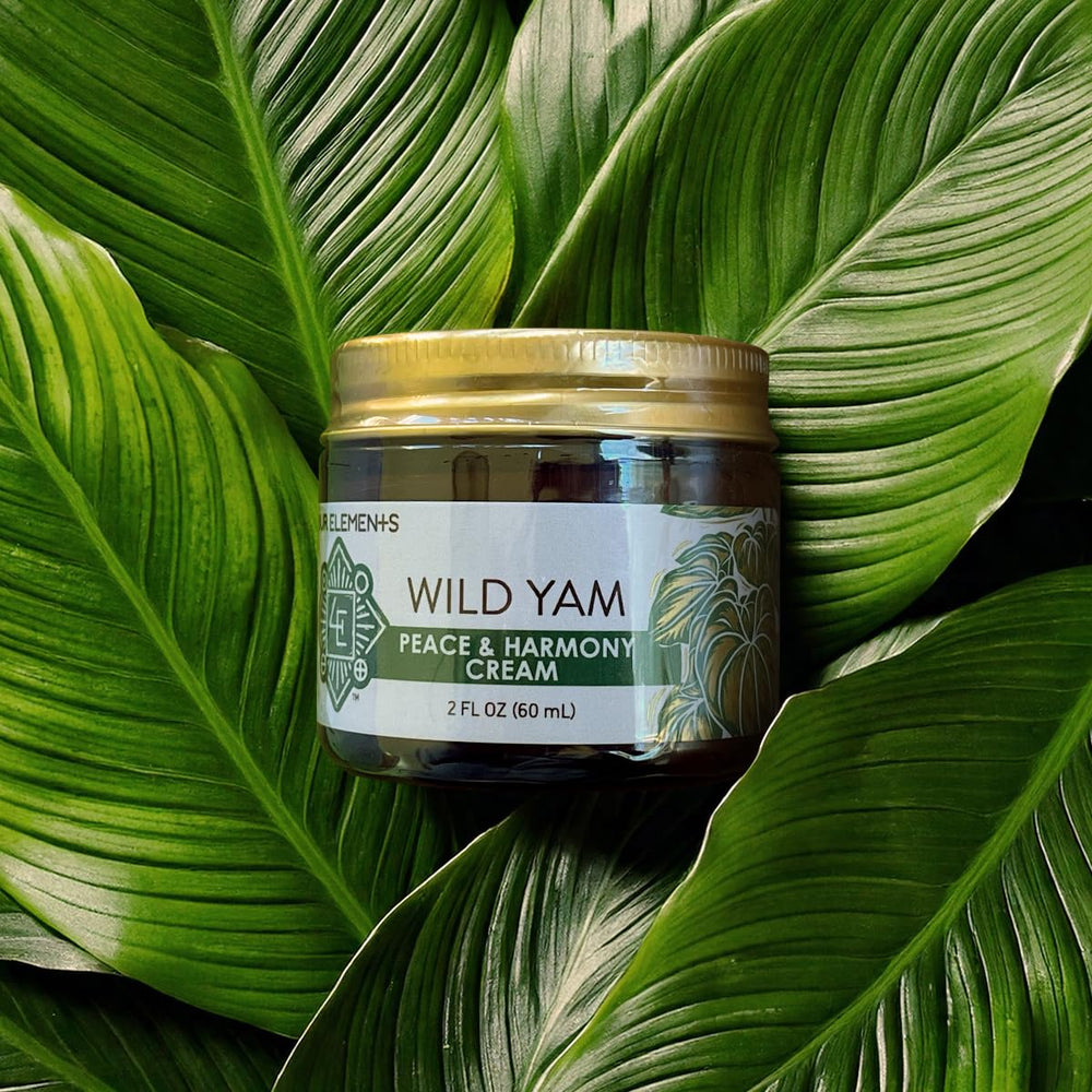 Four Elements Peace & Harmony cream on skin for soothing topical use.