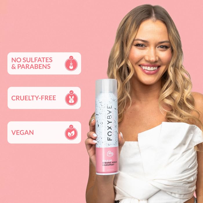 FoxyBae hair spray held in hands demonstrating volumizing effect