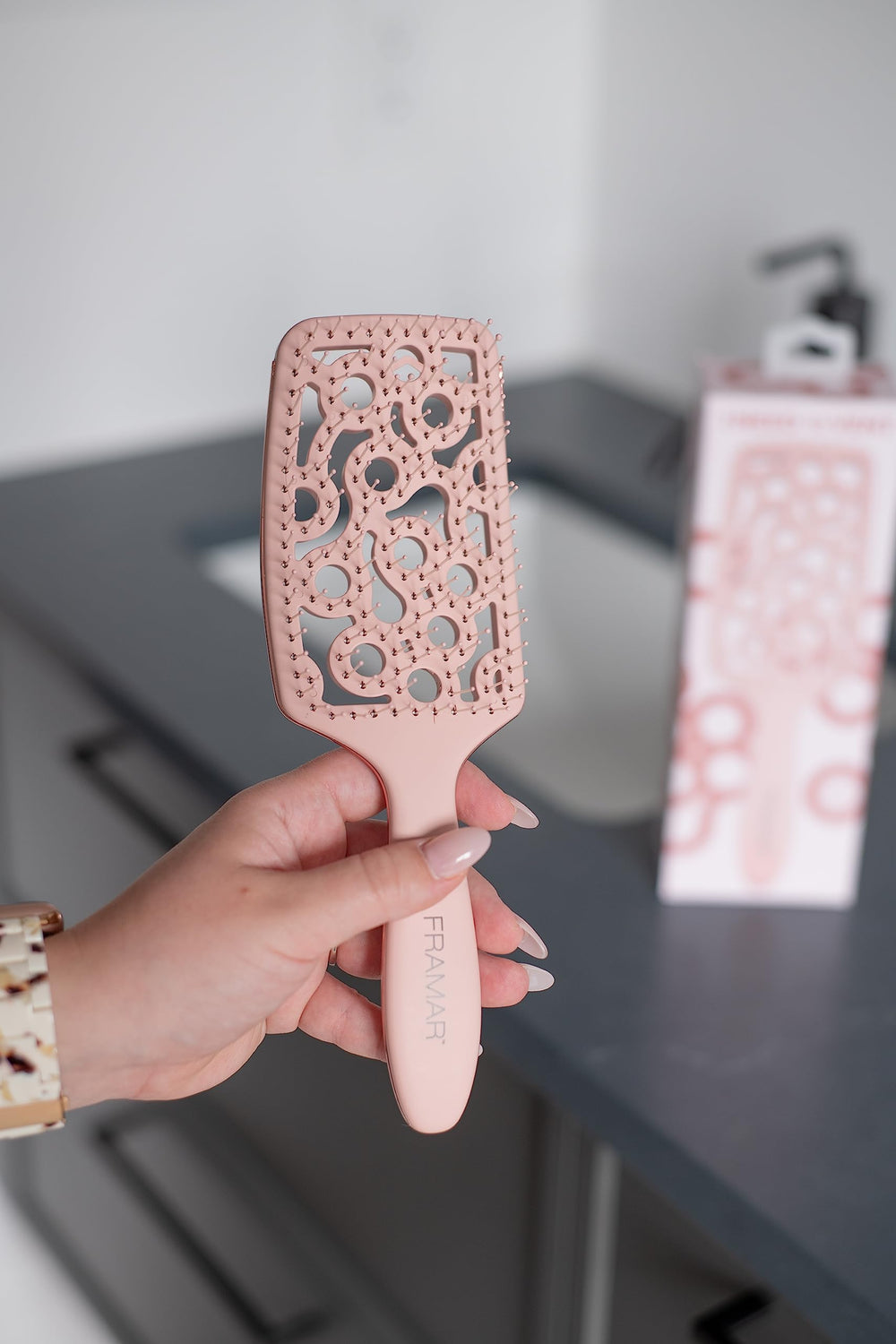 FRAMAR blow-drying ready brush speeds styling with even heat distribution.