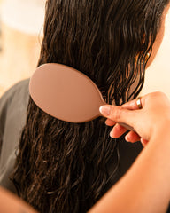 FRAMAR chocolate detangler massages scalp while brushing