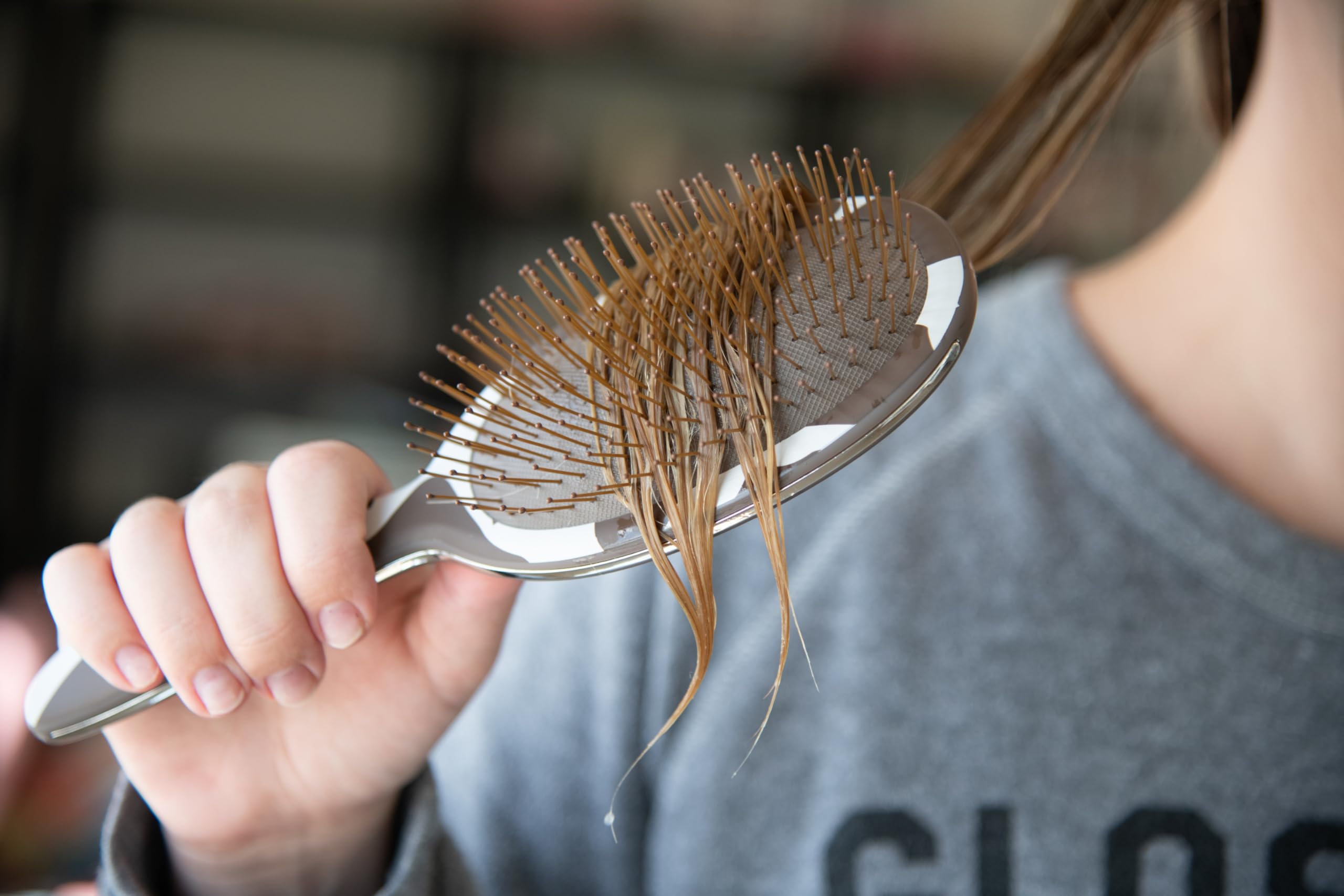 FRAMAR cow-print hair brush scalp-massage feature boosts circulation during brushing