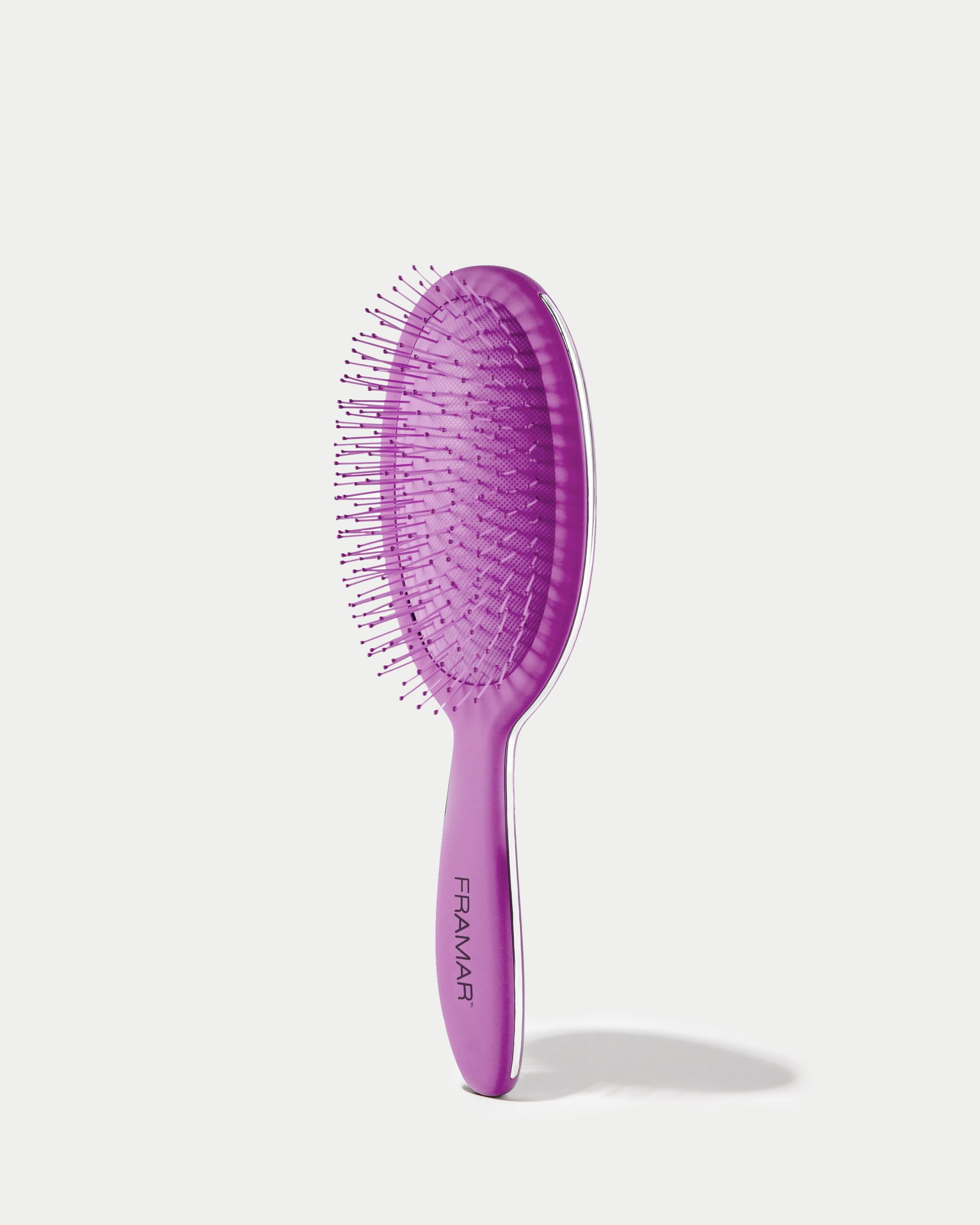 FRAMAR Detangling Brush compact purse-size, travel-friendly design.