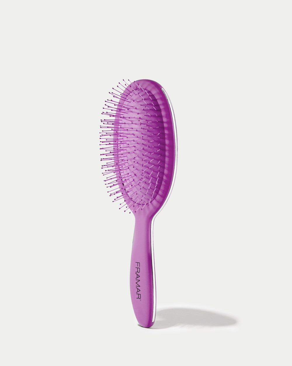 FRAMAR Detangling Brush compact purse-size, travel-friendly design.
