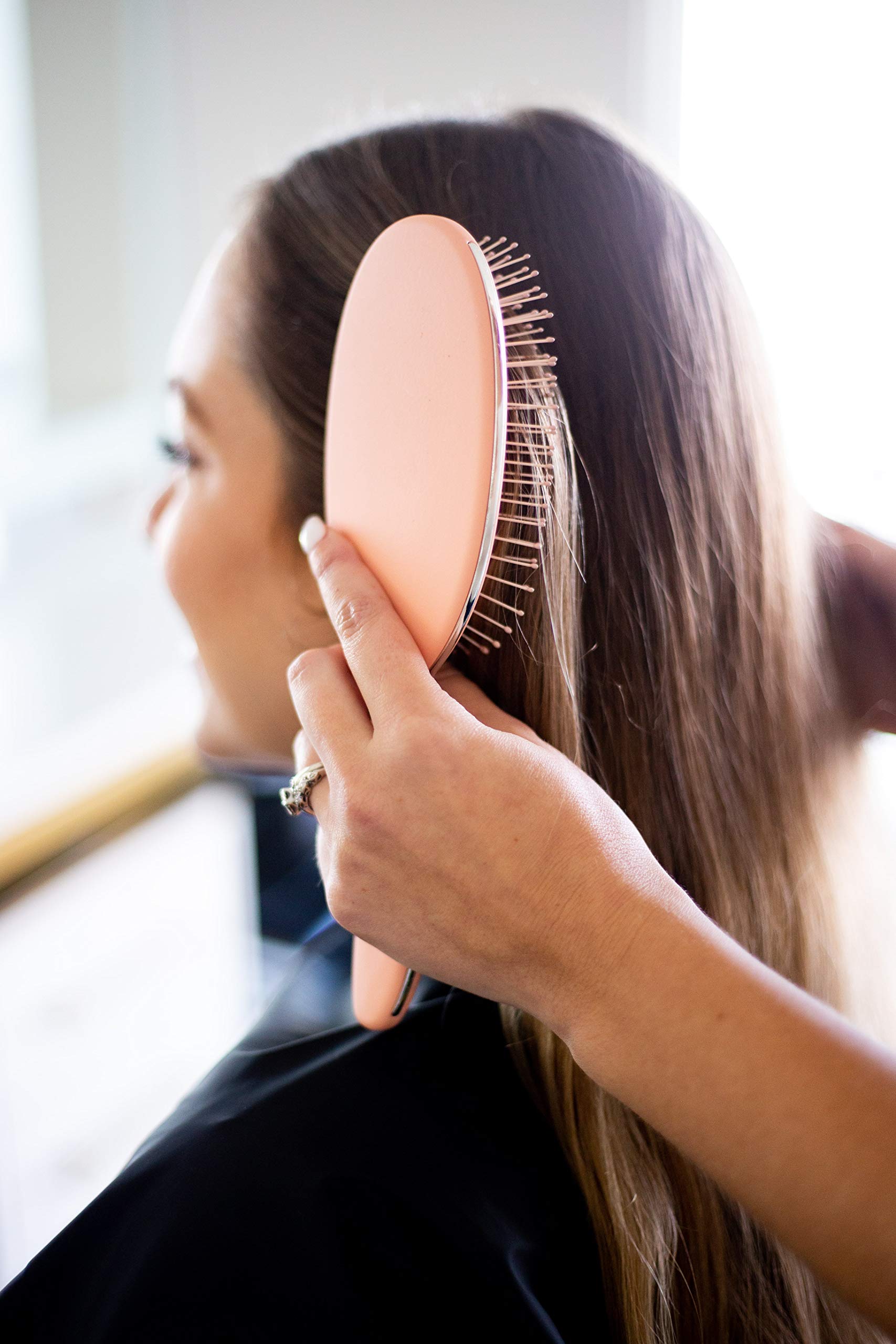 FRAMAR detangling brush slip-resistant handle provides comfy grip during brushing