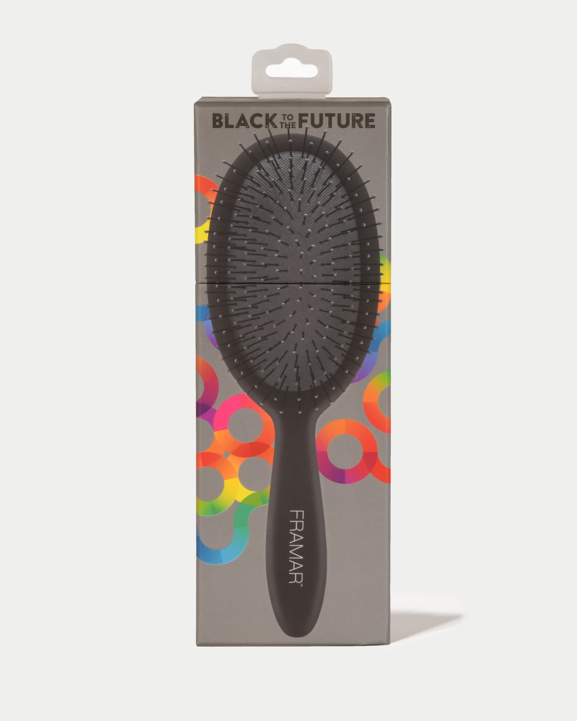 Framar detangling brush smooth bristle glide demonstrates effortless knot-free brushing