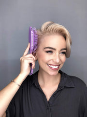 FRAMAR Detangling Brush used on wet hair to detangle without damage.