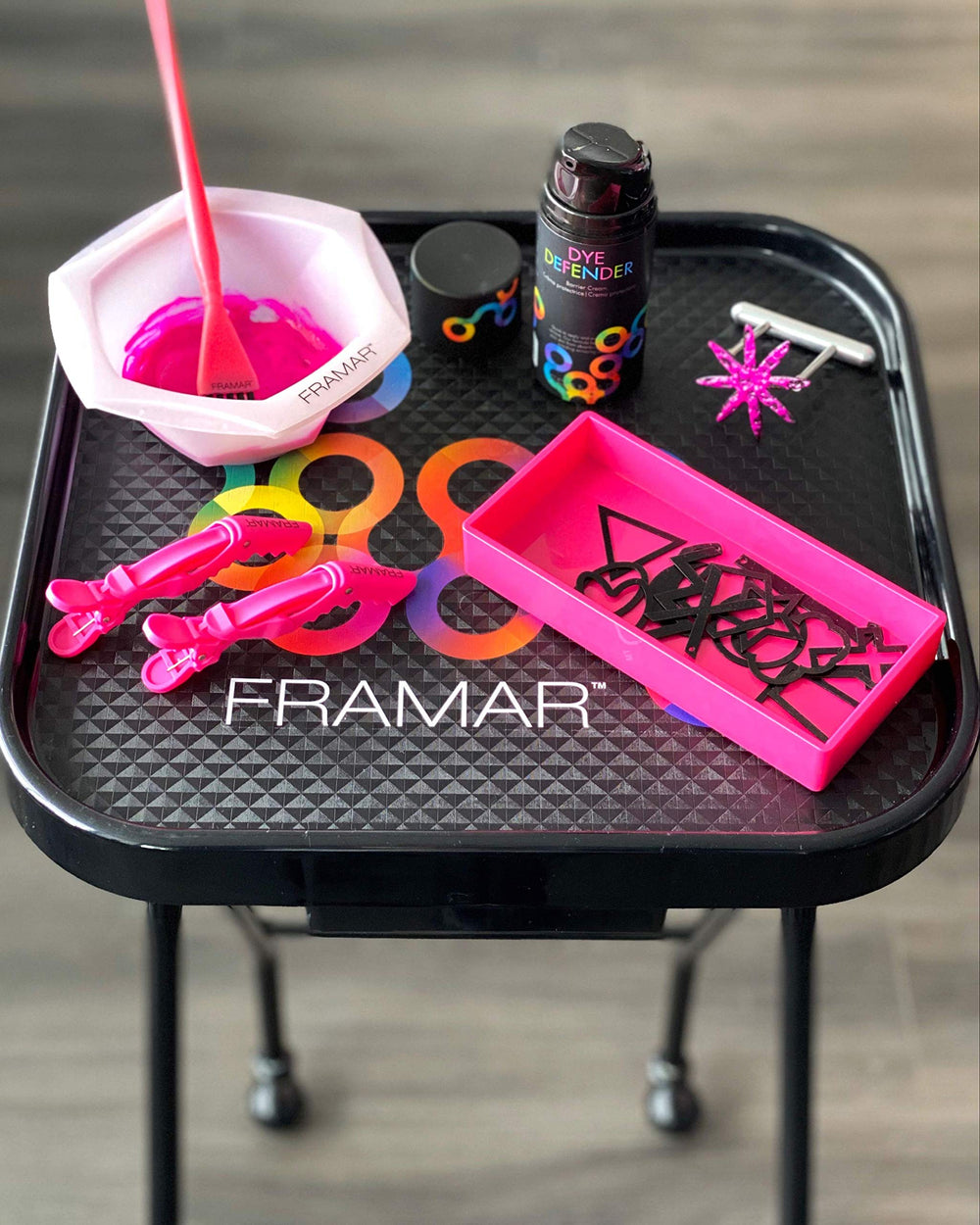 Framar Dye Defender on-store display emphasizes portable dye-protection solution.