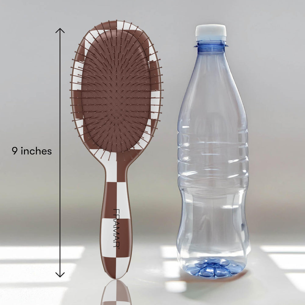 Framar hair brush glides through hair for a smooth, shiny finish.