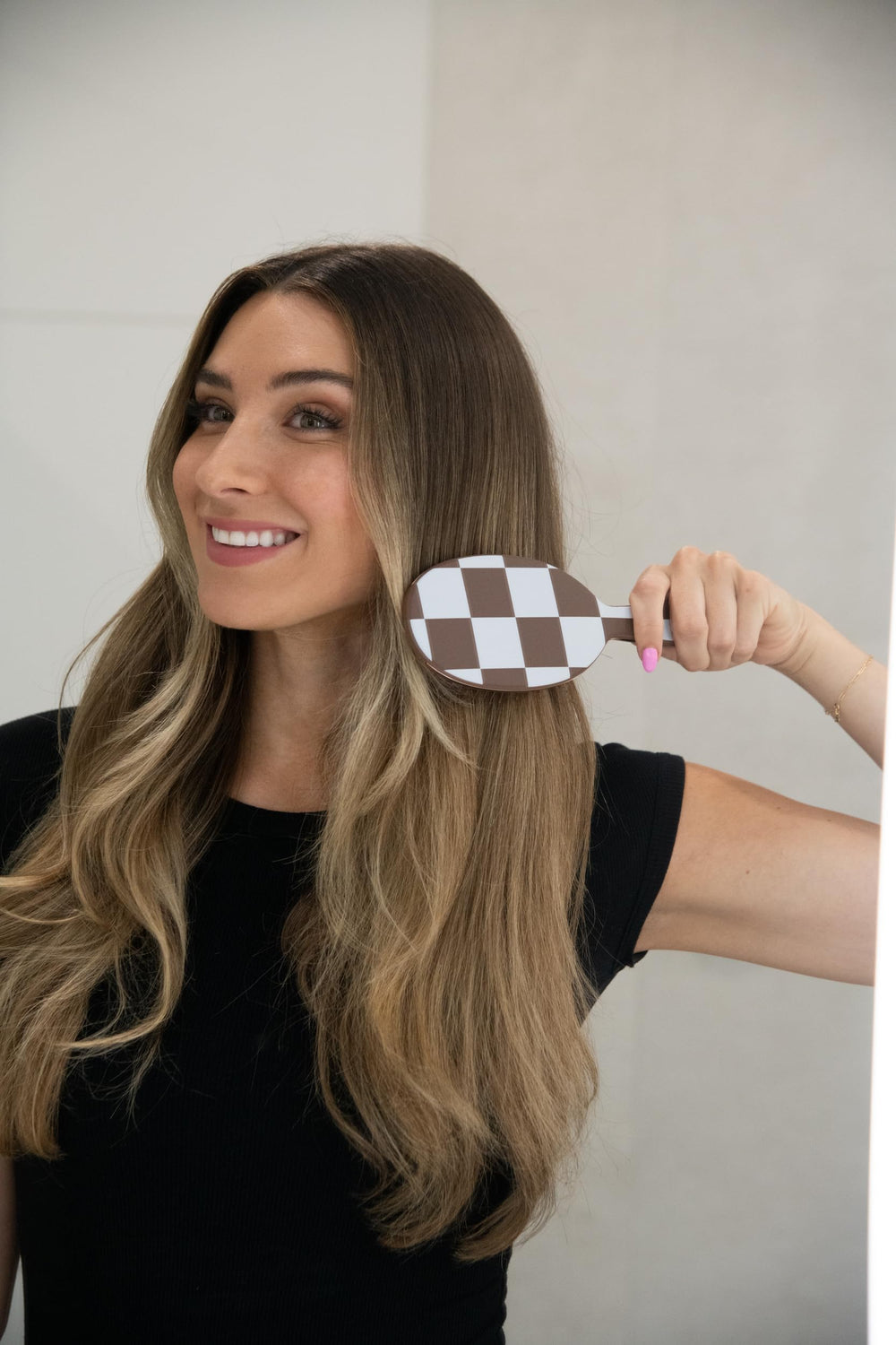Framar slim-handle grip prevents slipping during styling.