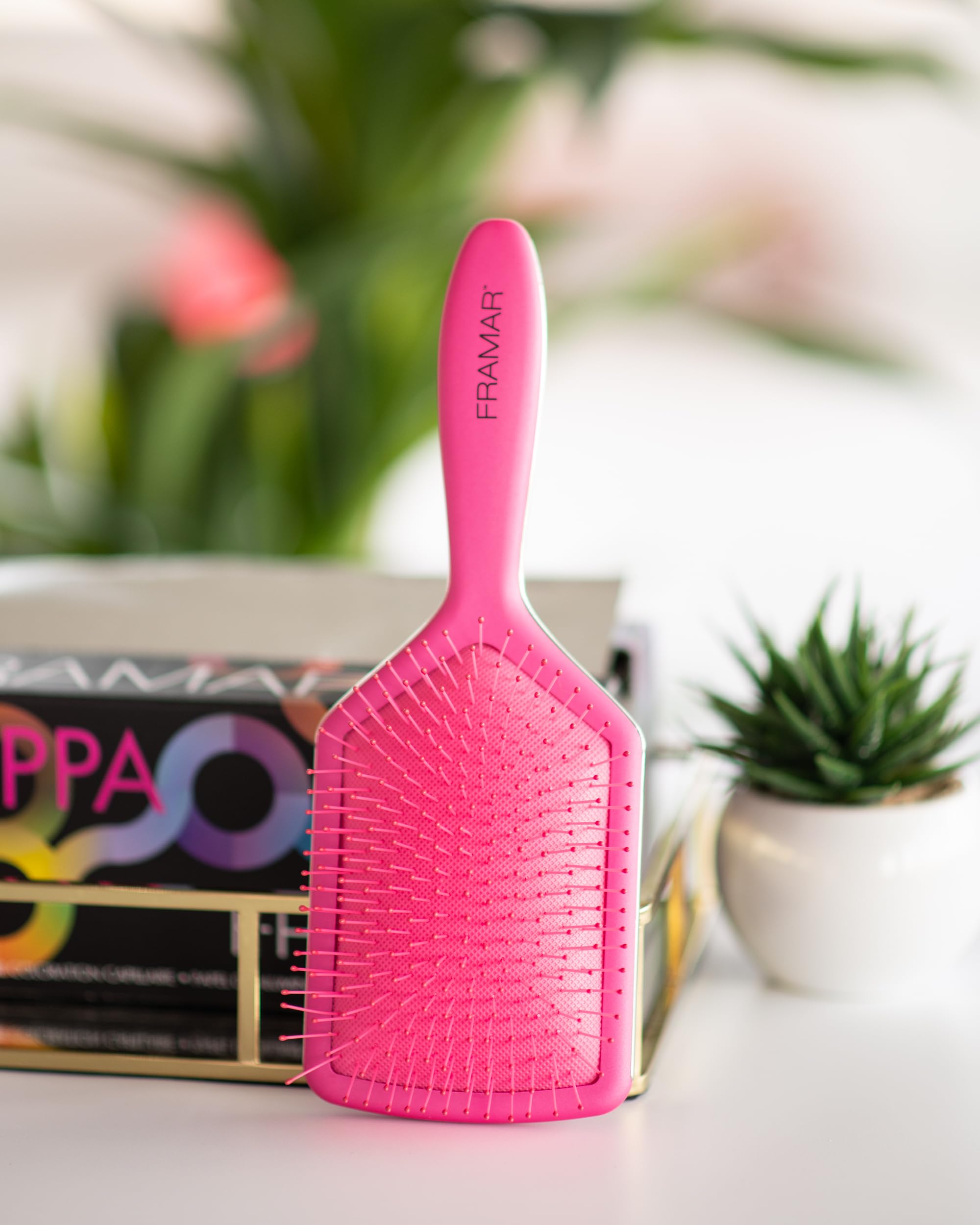 FRAMAR paddle-brush-silver-lining-detail pink shows stylish design on-the-go.