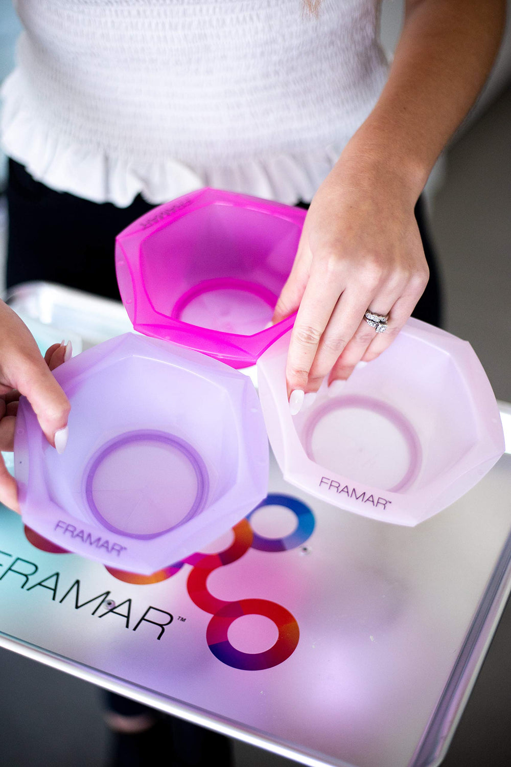 FRAMAR stackable color bowls neatly arranged for portable color stations.