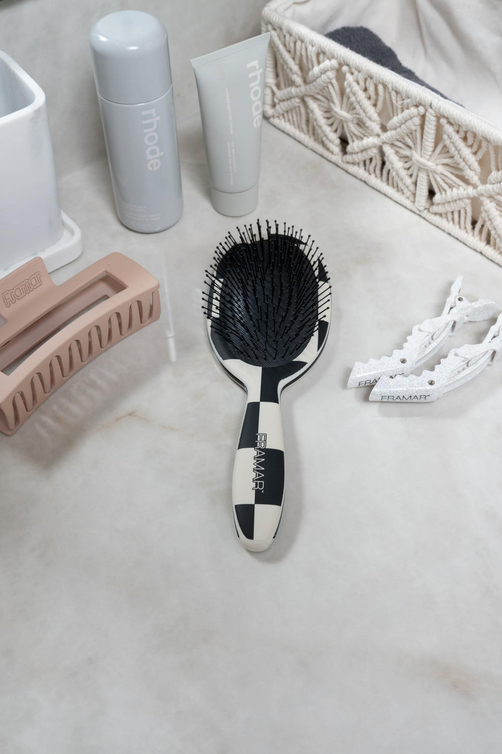FRAMAR travel-size-hair-brush ready for on-the-go detangling.