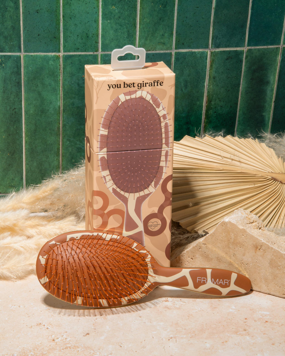 FRAMAR detangler brush with flexible bristles eases wet hair detangling without pain.