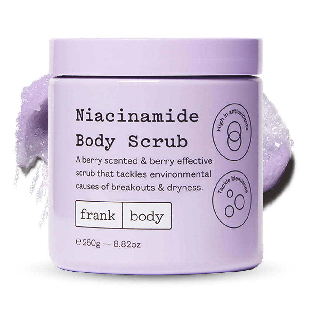 frank body niacinamide body scrub bottle berry scent delivers refreshing exfoliation for brighter skin.