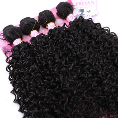 Frelyn 20in full-head look with kinky curls provides balanced silhouette and natural movement.