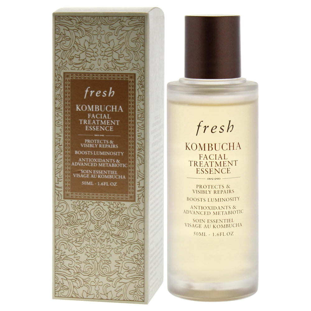 Fresh Kombucha Facial Treatment Essence being applied on cheek for immediate moisture.