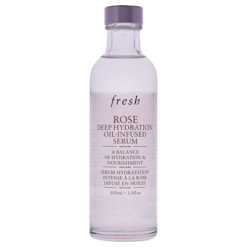 Fresh rosewater damask rose infused essence bottle highlighting calming hydration