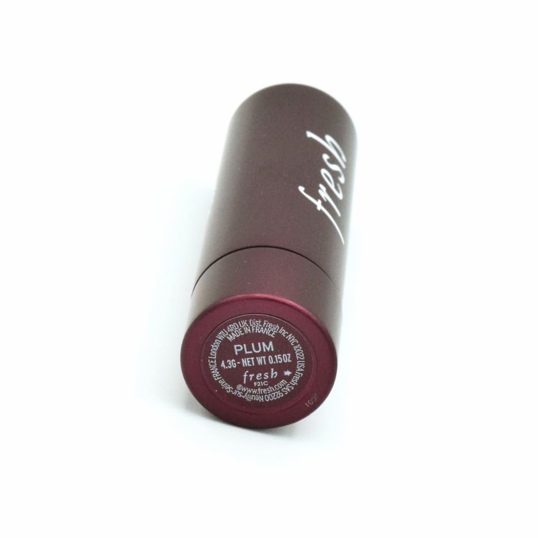 Fresh Sugar Lip Treatment Plum on skin demonstrates natural tint with lasting hydration.