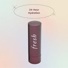 Fresh Sugar Lip Treatment Plum packaging emphasizes compact, travel-friendly lip care.