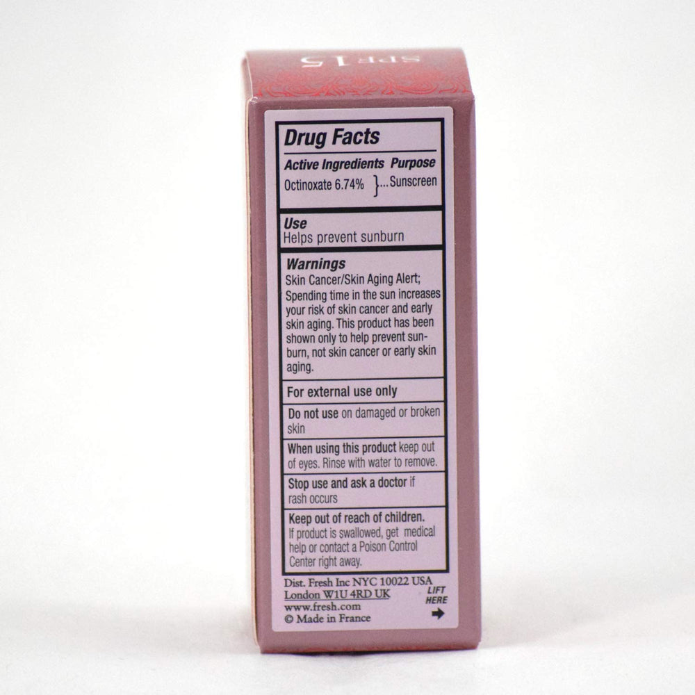 Fresh Sugar Lip Treatment SPF 15 Rose texture close-up showing nourishing formula.