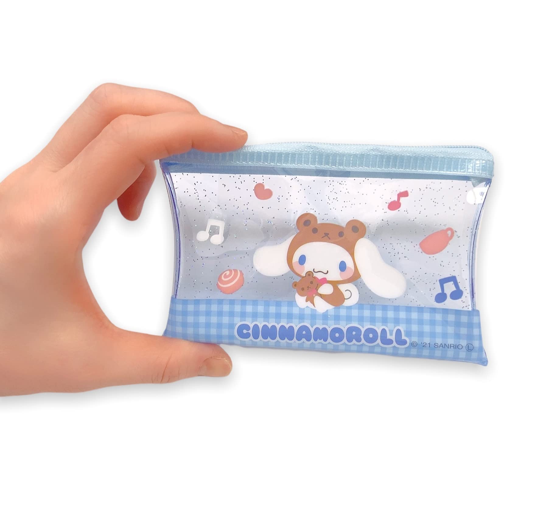 Friend Sanrio Cinnamoroll mini pouch in hand for travel-ready use