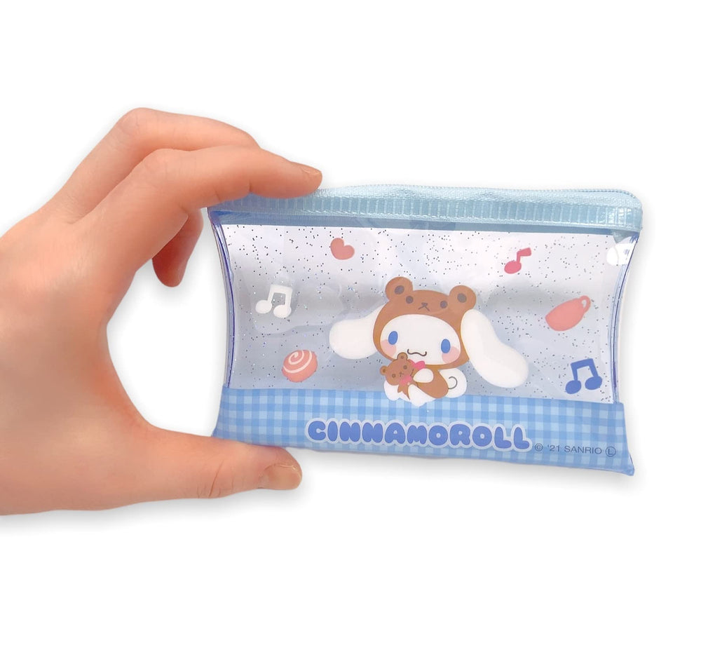 Friend Sanrio Cinnamoroll mini pouch in hand for travel-ready use