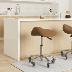 FRNIAMC saddle stool camel seat closeup highlights ergonomic saddle for comfortable seating.
