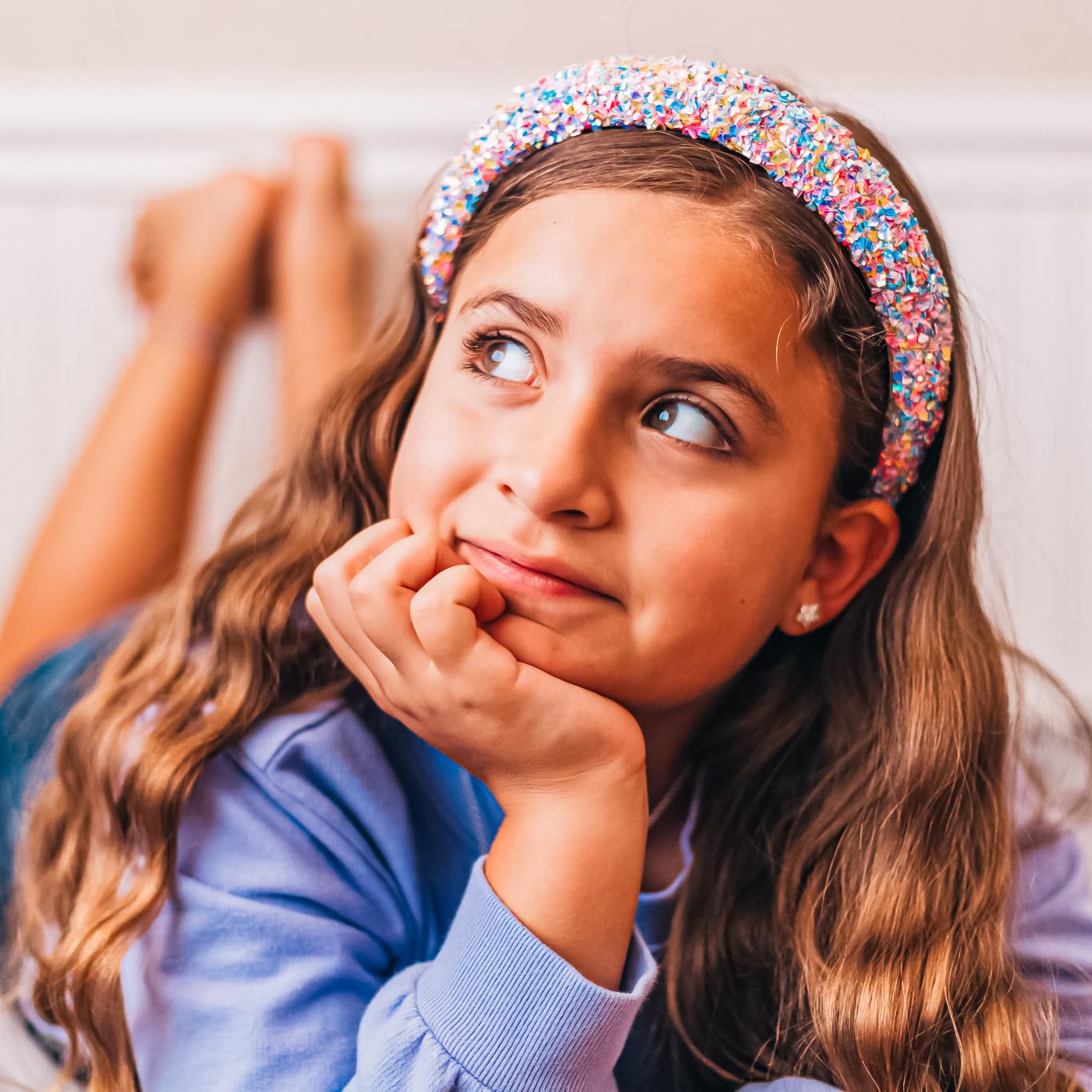 FROG SAC Padded Sequin Headband shows soft padding for secure, non-slip fit.