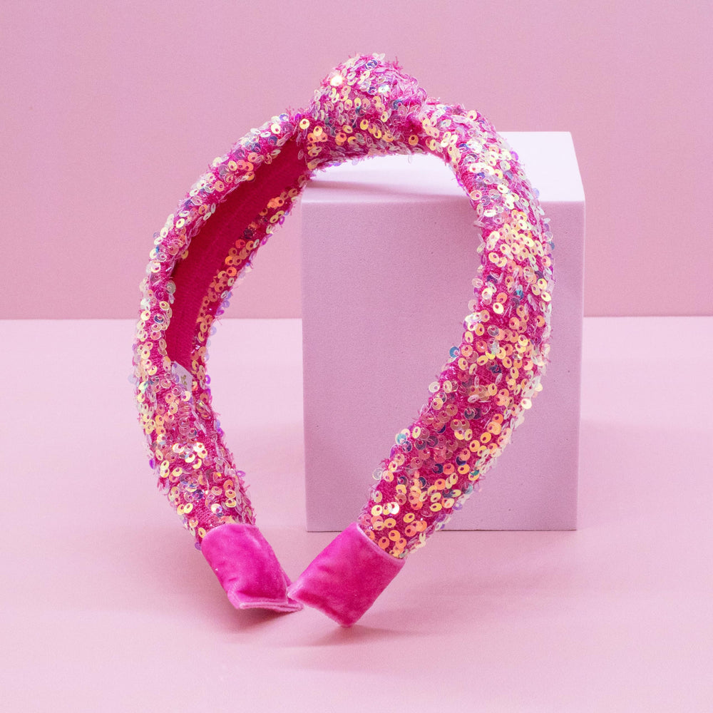 FROG SAC Sequin Knot Headband supports Girls, Inc. while adding sparkle to outfits.