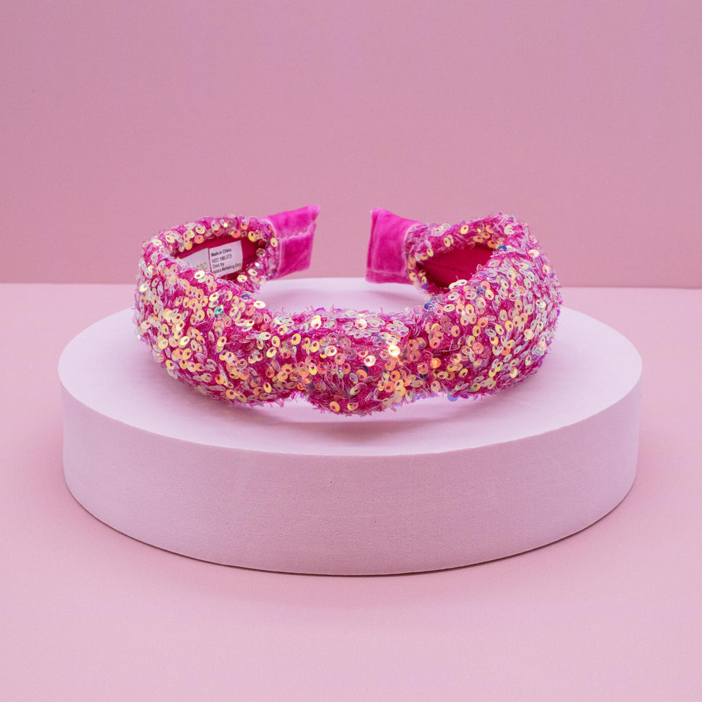 FROG SAC headband with iridescent sequins keeps hair tidy during school or play.