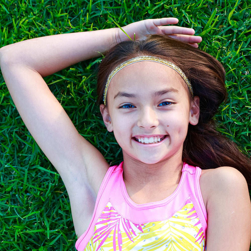 FROG SAC headbands worn by child portrait showing comfort and secure fit
