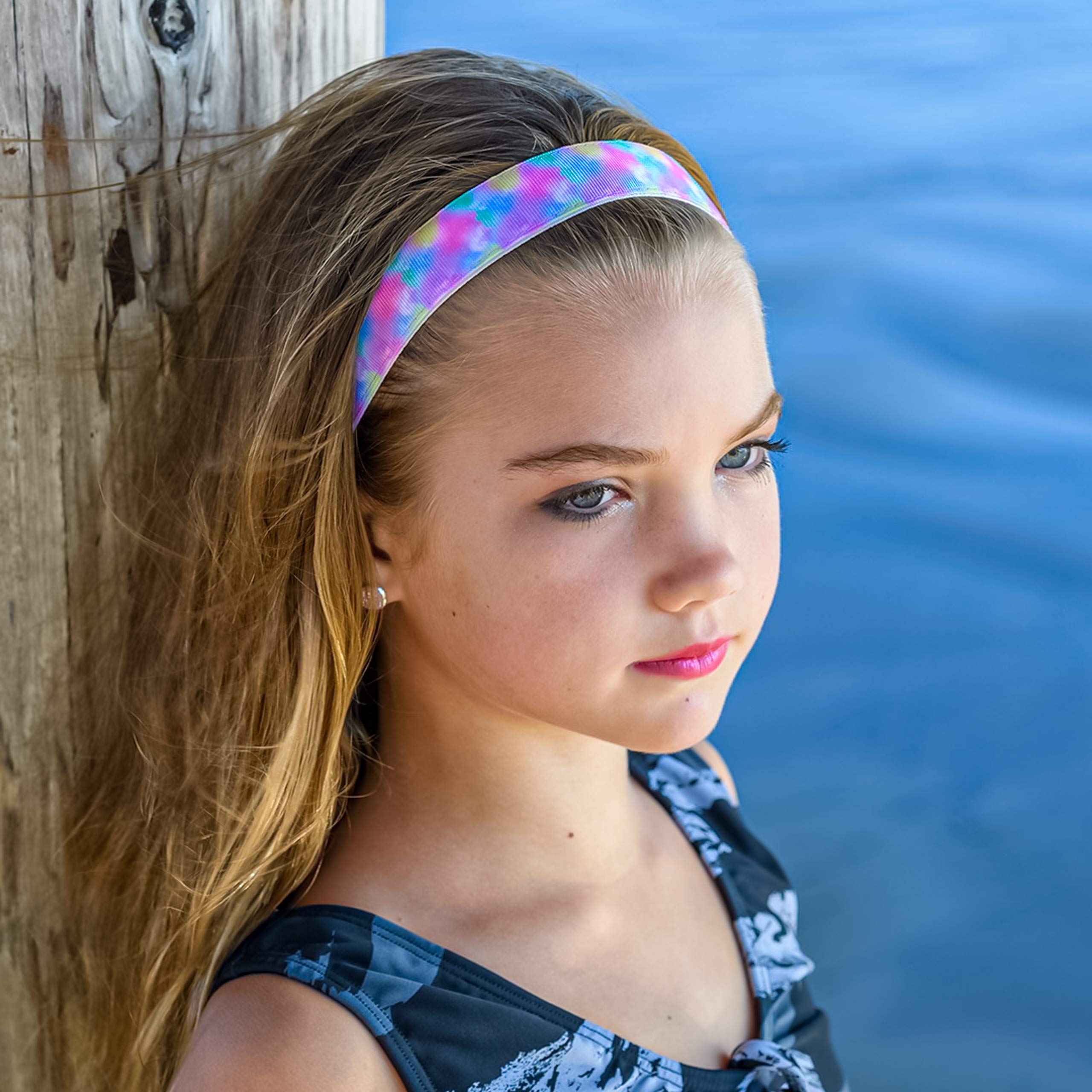 FROG SAC tie-dye headband rainbow front view demonstrates adjustable fit for growing kids