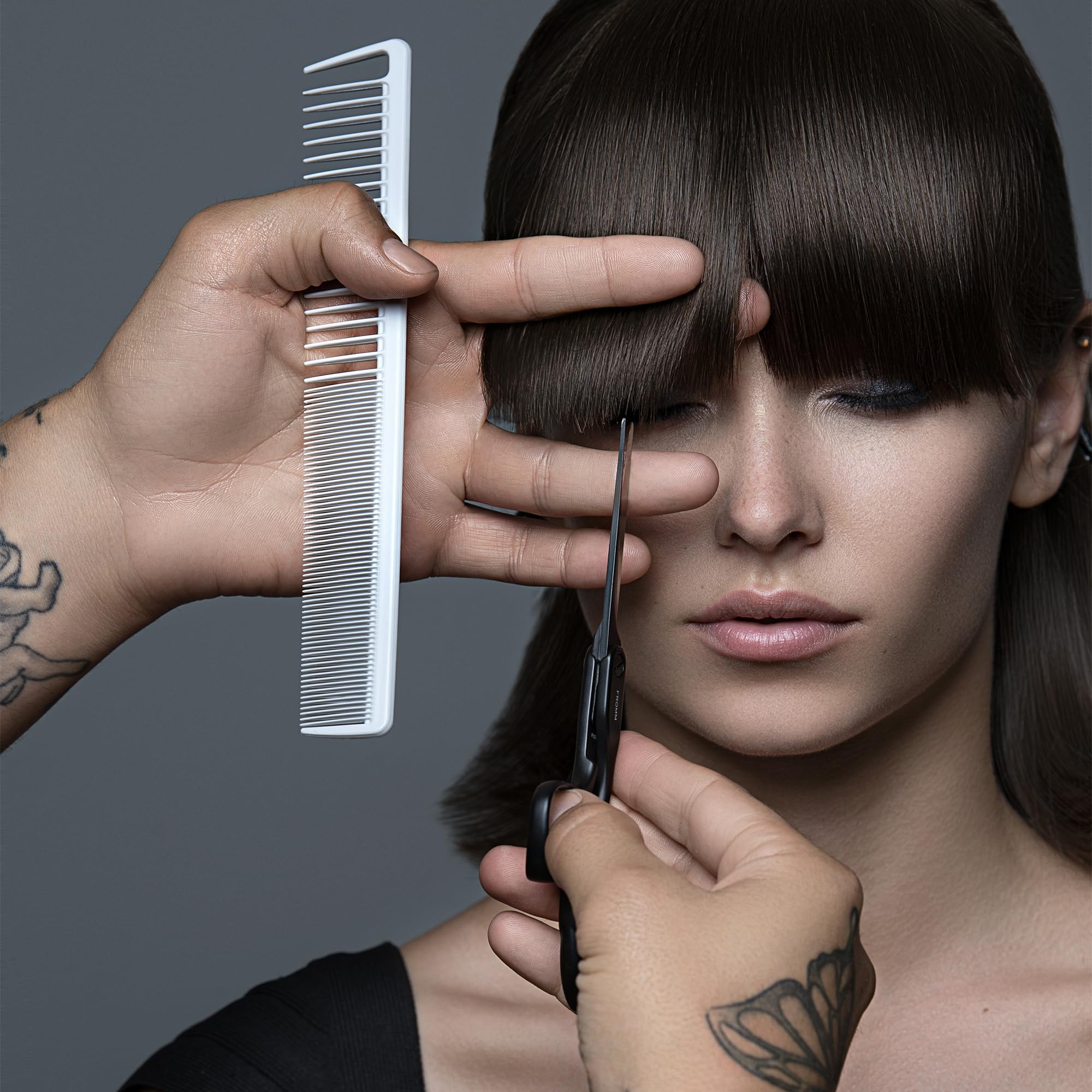 Fromm F3022 ProGlide 8-inch comb with flexible teeth glides with minimal tug.