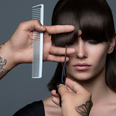 Fromm F3022 ProGlide 8-inch comb with flexible teeth glides with minimal tug.