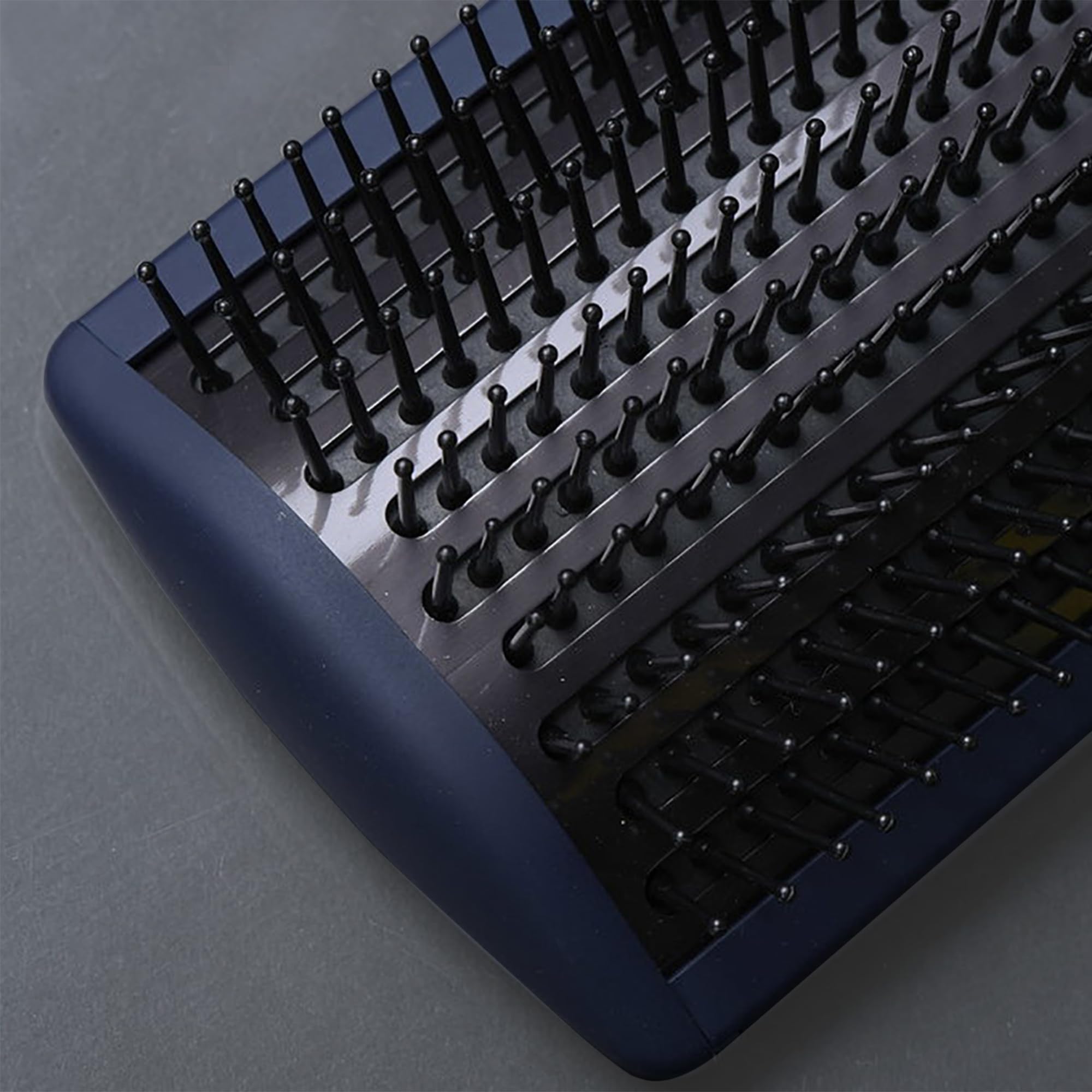 Fromm Intuition travel-friendly paddle brush ideal for on-the-go styling