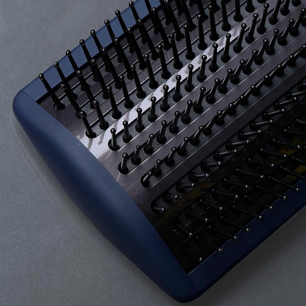 Fromm Intuition travel-friendly paddle brush ideal for on-the-go styling