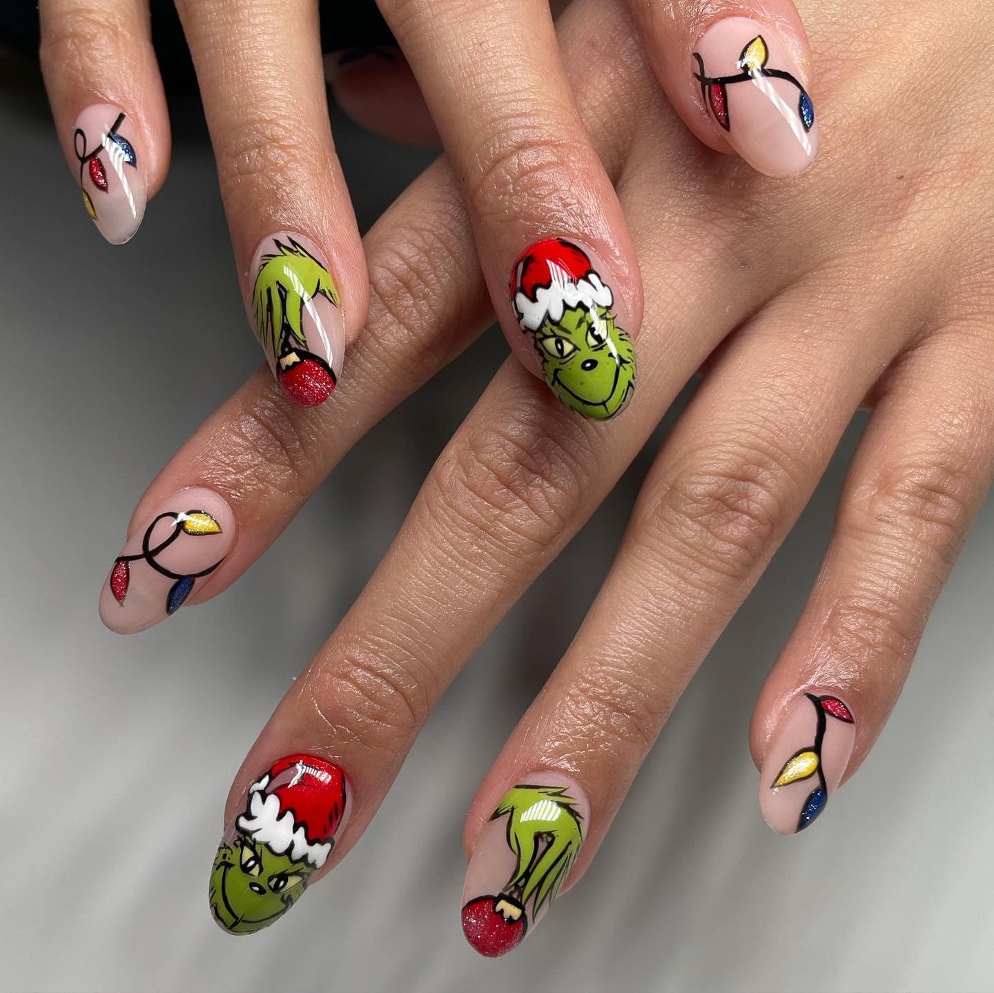 FUKIDOG Christmas press-on nails with green monster design for festive quick manicure.